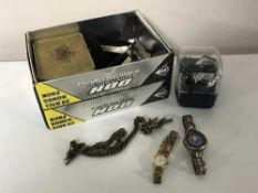 A box of assorted wristwatches, watch movement,