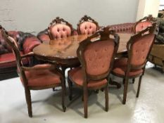 An Italian style dining table and six chairs