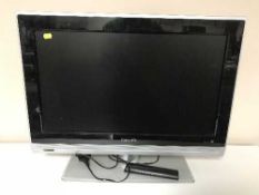 A Philips 26 in TV with lead and remote