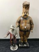 A shop advertising figure of a chef and one other