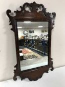 A mahogany Chippendale style wall mirror