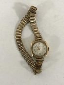A lady's 9ct gold Record wristwatch on 9ct bracelet