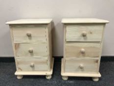 A pair of light pine three drawer chests