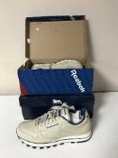 A boxed pair of new Reebok trainers and a boxed pair of new Lonsdale trainers