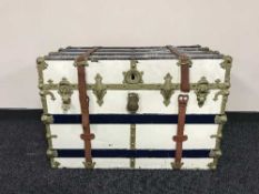 A painted luggage trunk and a continental oil on canvas of a lady