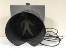 An electric Green Man crossing sign