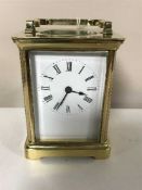 A brass cased carriage clock by Richard & Co,