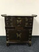 An oriental lacquered cabinet