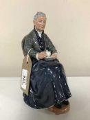 A Royal Doulton figure - The Cup Of Tea HN 2322