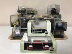 A collection of die cast vehicles including Mini Cooper etc