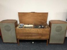 A teak cased Leak Stereo 30 record player with LP records and pair of teak cased speakers