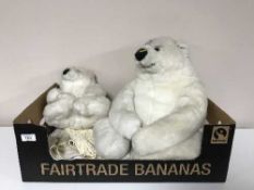 A large polar bear figure with cub, lace, linen,