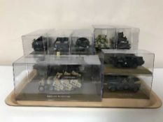 A collection of die cast tanks and military vehicles