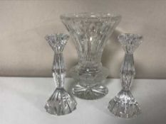 A pair of good quality crystal candlesticks and a crystal vase