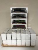Eighteen railway locomotive collector's models on stands