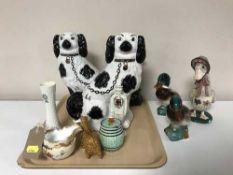 A tray of two Staffordshire dogs, duck ornaments,