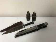 A Bowie knife in sheath,