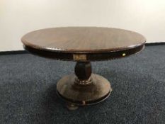 A Victorian mahogany pedestal dining table