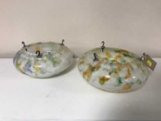 Two marbled glass lightshades