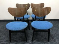 A set of four mid 20th century dining chairs