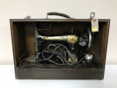 A Singer sewing machine in case