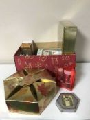 A box containing a quantity of perfumes and cosmetics