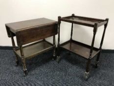 An oak drop leaf trolley and one more similar