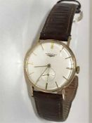 A Gents vintage Longines 9ct gold wristwatch