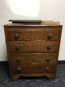 An oak four drawer mirror back dressing chest