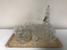A tray of cut glass wine glasses, brandy glasses,