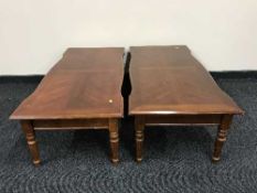 A pair of contemporary mahogany coffee tables