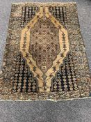 An antique Kurdish Maslaghan rug