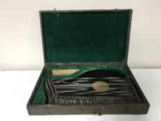 An antique zither in wooden case