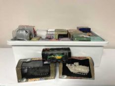 A crate of die cast vehicles and boxed model cars - racing cars etc