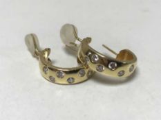 Heavy 18ct diamond earrings, approximately 1.2 ct, 12.