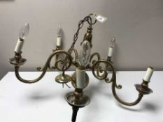 A heavy brass five branch chandelier