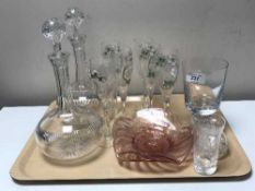 A pair of Edwardian crystal decanters together with antique and later glass, vases, coloured dishes,