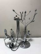 Two contemporary floor lamps together with matching table lamp,