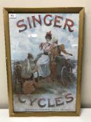 A gilt framed Singer Cycles advertisement