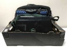 Three laptop bags together with three laptops by Acer,