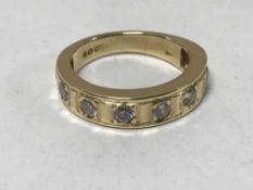 18ct half eternity ring with eight stones 5.