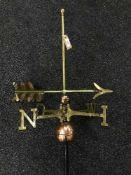 An early twentieth century copper and brass weather vane