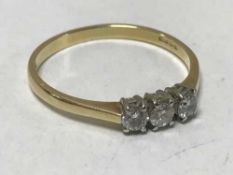 Three stone diamond ring