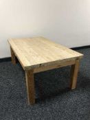 A stripped heavy pine coffee table