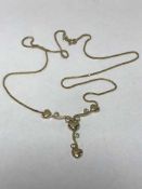 Gold and diamond necklace