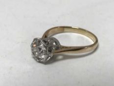 A 14 ct gold solitaire diamond ring, approximately 0.6 carat.