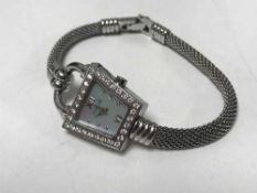 Corum watch with diamond bezel and dial (mother of pearl) approximately 1ct diamonds (cost new -