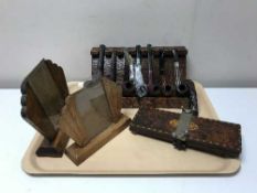 A tray of wooden pipe rack, pipes, inlaid tie press,