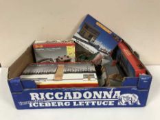 Three boxes of Hornby railway accessories, track,