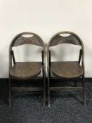 A set of nine mid twentieth century folding chairs